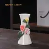 Textura de porcelana de osso Porcelana branca de Dehua Flores beliscadas à mão Entrada da sala de estar Armário de vinhos Gabinete de TV Uso diário em casa Plantas verdes Arranjo de flores