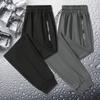 [Fábrica en stock] Pantalones de seda de hielo para hombre, talla grande, rectos, casuales, de verano, finos, de nailon.