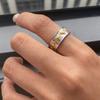 Jingqiao design amor cor ouro 18K aço inoxidável combinação de cores ouro e prata vento maré líquida rebite padrão amor anel
