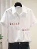 Camisa blanca de manga corta bordada con dibujos animados para mujer, transfronteriza europea y americana de Amazon, nueva camiseta versátil de verano para ir al trabajo