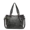 Bolsa Tote Grande Capacidade Estilo Retro Europeu e Americano Solo Sujo Feminina 2025 Nova Coleção Primavera Bolsa de Ombro Transversal Simples Casual Tendência