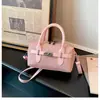 Nova Bolsa Boston Pequena para Mulheres 2026, Estilo Suave e Delicado, Bolsa Almofada de Mão com Fechadura, Bolsa Transversal Versátil para o Dia a Dia