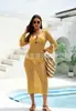 Estilo Nuevo Transfronterizo Europeo y Americano Textura Hueca Cuello en V Botón Redondo Manga Larga Vestido Largo de Vacaciones Cubre Traje de Playa Vestido Largo sin Espalda