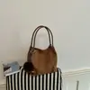 Bolso cubeta retro de nicho 2026 principios de otoño nuevo bolso de mano estampado de leopardo bolso de hombro mate bolso bandolera de gamuza para mujer