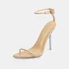 Nuevas sandalias de tacón alto con correa ultradelgada de comercio exterior transfronterizo europeo y americano, zapatos de moda para mujer simples y sexys de tacón de aguja con punta abierta