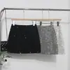 Tiro Real Falda de Lentejuelas Falda Mujer Chica Picante Americana Forma A Pequeña Plata Brillante Brillante Falda Anti-deslizamiento 8258