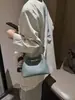 Bolso cubo con patrón de lichi para mujer, nuevo modelo 2026, bolso de mano, bolso de hombro, bolso cruzado, versátil para ir al trabajo, bolso cesta pequeño con colgante