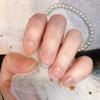 Parche para uñas postizas de color caramelo, estilo francés, con acabado perlado, impermeable y desmontable.