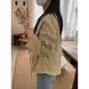 Gabardina corta de alta gama para mujer, nuevo modelo 2026, diseño holgado con cuello alto ceñidor a la cintura, chaqueta casual, top de moda