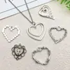 Colgante Hueco con Forma de Corazón de Plata Antigua con Pinchos DIY Collar Pendientes Accesorios de Joyería de Aleación con Forma de Corazón Colgante Transfronterizo