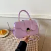 Bolso de mano retro de alta gama con tapa abatible para mujer 2026 nuevo bolso cuadrado pequeño con cierre simple para el trabajo de un solo hombro cruzado bolso de mujer