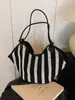Bolsa de Palha Estilo Cesta Transfronteiriça para Mulheres 2025 Nova Tendência Casual Estilo Preguiçoso Bolsa Tote de Ombro Único para Axila Bolsa de Trabalho