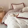 Juego de ropa de cama de alta gama Clase A 100% algodón 60 hilos de cuatro piezas hecho de algodón de fibra larga de Xinjiang, funda de edredón de algodón puro, sábana plana y sábana bajera