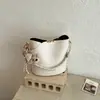 Nuevo bolso cubeta de otoño e invierno para mujer, moda vintage, bolso cruzado elegante y versátil, diseño de nicho, bolso de un solo hombro para mujer
