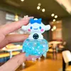 Botella de arena movediza creativa DIY Campana de viento aceite luminoso flotante llavero bolsa Colgante de coche pequeño regalo fabricante