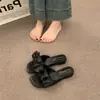 Pantuflas dulces de estilo francés con lazo para mujer, calzado de exterior primavera/verano 2026, diseño único, suela suave, sandalias casuales antideslizantes