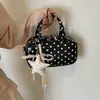 Bolso de lunares de nicho súper popular para mujer, nuevo y exquisito mini bolso cruzado versátil 2026, bolso de mano cuadrado pequeño de gran venta
