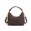 Bolso cruzado retro de un solo hombro de nicho, Bolso tipo lonchera esmerilado para llevar en la mano, Bolso tejido para mujer de moda de venta caliente transfronteriza para llevar debajo del brazo