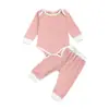 AliExpress conjunto de dos piezas de tela de punto para bebé de manga larga de otoño e invierno traje de bebé de color liso europeo y americano para hombres y mujeres