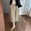 Zedaijiai: Sencilla y elegante para el trabajo, con un diseño dividido, tela fluida y una silueta ligeramente holgada en línea A, esta falda de longitud media estilo tulipán es perfecta para el uso diario.