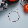 Collar con múltiples colgantes de hacha simulada retro oscuro transfronterizo europeo y americano para mujer, pulsera creativa de gota de sangre roja exquisita y única