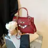 Bolsa de Nicho Moda Coreana Feminina 2025 Nova Bolsa de Ombro Transversal Estilo Coreano Ins Bolsa Carteiro Bolsa Kelly