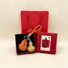 Chaveiro Pingente Dourado do Ano da Ovelha com Decoração em Folha de Ouro Conjunto em Caixa de Presente Personalizado para Negócios Presente Personalizado Atacado