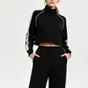 Conjunto deportivo casual transfronterizo para mujer, nuevo estilo otoño e invierno, conjunto de dos piezas con chaqueta de fitness de manga larga y pantalones rectos holgados que estilizan.