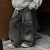 Ropa infantil 2026 otoño nuevo estilo coreano para niños pantalones cargo de mezclilla con salpicaduras de tinta blanca bolsillo grande pantalones largos modernos para niños