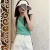Verão 2025 Novo Top de Tricô Sem Mangas com Gola Redonda Doce e Picante de Nicho Slim Fit Camisola Suéter Versátil para Mulheres