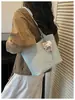 Bolso tote de mimbre tejido a mano retro de nicho para mujer, nuevo y moderno 2026 de gran capacidad para el trabajo y los desplazamientos, bolso de hombro de moda