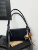 Bolso de Leopardo de Nicho Otoño e Invierno 2025 Nueva Moda Correa Ancha para el Hombro Bolso Cruzado Bolso Cuadrado Pequeño Simple de Alta Gama Maillard