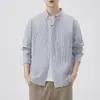 Camisa de manga larga 2026 moda primavera y otoño camisa de rayas para hombre chaqueta casual holgada versátil top chaqueta