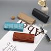 Moda clásica simple caja de cuero para gafas de miopía portátil anti-presión anti-caída caja de almacenamiento para gafas de sol fabricantes mayoreo