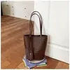 Bolsa Feminina Estilo Retro Relaxado Versátil Bolsa Saco 2026 Nova para o Dia a Dia Versátil Pingente Portátil de Ombro