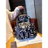 Mochila de Gran Capacidad con Estampado de Marca de Moda 2026 Nueva Moda Casual de Tela Oxford para Mujer Bolso de Viaje