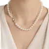 Collar con hebilla con fuelle de perla Shijia estilo francés de alta gama, estilo retro, estilo coreano, cadena de clavícula de nicho de lujo ligero.