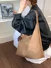 Diseño casual, elegante bolso de hombro de gran capacidad, tendencia de moda 2026, bolso tote simple de nicho para el hombro para mujer