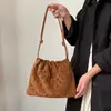 Bolso Tejido de Nube Retro Hecho a Mano de Ante Vacuno 2025 Nuevo Bolso de Basura de Nicho Bolso Tote de Cuero Genuino