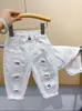 Pantalones Infantiles Rantuo 2026 Estilo Nuevo para Niños Medianos y Mayores Serie Blanca Diseño Unisex Pantalones Largos Simples Modernos Transfronterizo