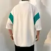 Nueva camisa de verano para hombre de cinco puntos con manga corta, bloques de color, lujo ligero, corte holgado, seda helada fresca y una bonita caída