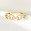 Anel Geométrico Oco com Inlay de Cobre e Zircônia Luocheng Luxuoso com Corrente e Diamantes Inlaid Anel de Dedo Fábrica de Joias Atacado
