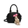 Bolso Boston portátil de estilo sencillo de Corea del Sur, color dopamina, estilo dulce e informal, bandolera para mujer