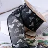 Estampado de cabeza de ratón de dibujos animados cinta de gasa lazo DIY accesorios para el cabello flores regalo horneado empaque de pastel