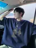 Camiseta de Manga Curta com Estampa American Graffiti para Homens Verão 2026 Nova Streetwear Solta Casual Algodão Puro Meia-Manga