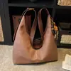 Bolso bandolera versátil para mujer 2026 nuevo estilo moderno bolsa de tacto de alta gama bolso casual para el trabajo de un solo hombro bandolera bolso para el trabajo