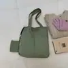 Bolso tote de gran capacidad a la moda para mujer, nuevo de verano 2026, estilo casual artístico perezoso, versión coreana, bolso de tela para hombro/bajo del brazo