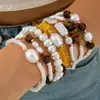 Yong Ge Accesorios Retro Europeo y Americano Conjunto de Pulseras Multicapa de Perlas y Piedra Triturada Estilo Vacaciones en la Costa Pulsera Elástica Apilable
