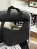 Bolsa de dumpling fruncida Mi Xing Qian Ting para parejas, estilo minimalista japonés, adecuada para exploración urbana, clases y compras, bolso cruzado