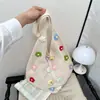 Comércio exterior transfronteiriço feito à mão floral estilo coreano casual 2026 palha moda diária bolsa de ombro tote bolsa de malha